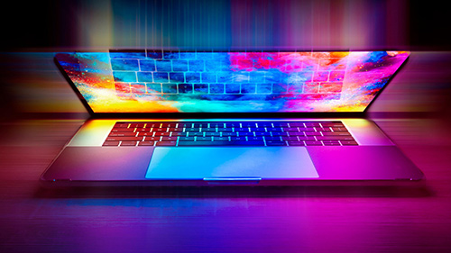 Laptop with multi-colour screen lighting